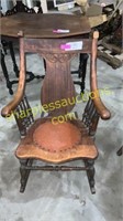 Antique rocking chair with leather seat