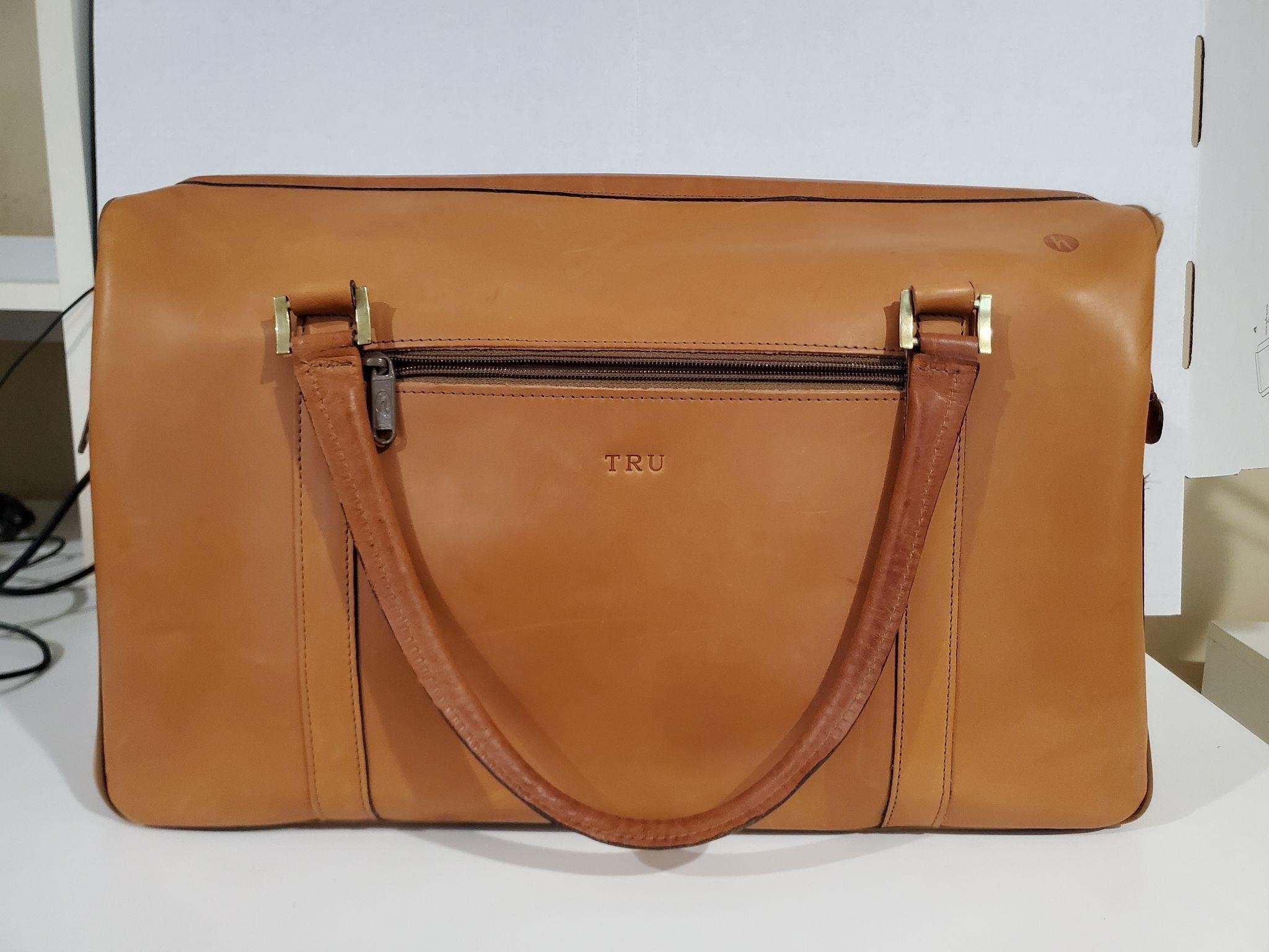 Vintage tan leather overnight bag