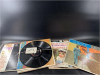 Assorted 33rpm records including Fats Domino