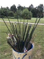 Large lot of garden/tomato rods in barrell