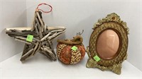 Picture frame, wooden star, and pumpkin decor