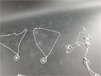 Assorted pendants and chains with small amount of