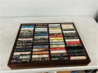 collection of cassette tapes in case