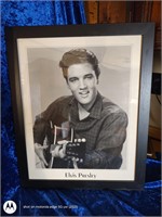 Young Elvis Presley behind glass art