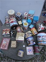 Table full of tin canisters