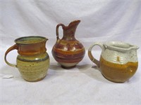 Group of 3 pottery pitchers