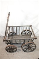 Primitive wooden goat hay cart
