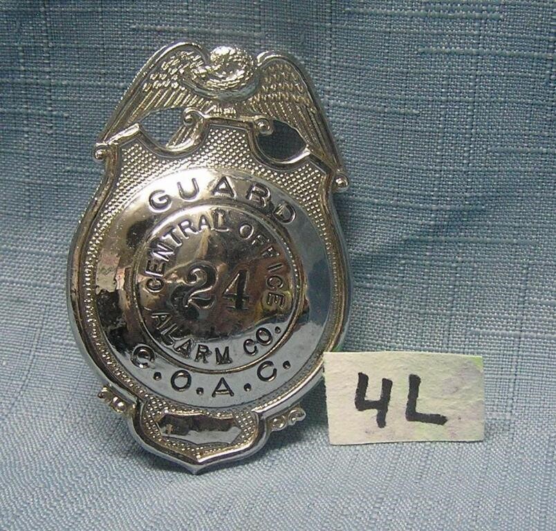 Central Office Alarm Co. security guard badge