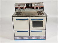 VINTAGE TIN WOLVERINE KIDS STOVE