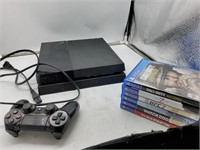 Sony PS4 with controller and games