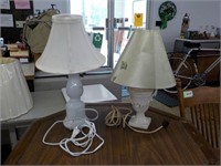 2 white glass lamps