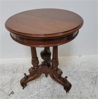Renaissance Revival carved walnut center table