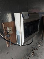 Two heaters, 1 mounted on wall and 1 loose on