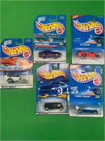 Five vintage hot wheels on cards, new old stock