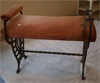 Brass or wrought  iron bench with padded seat