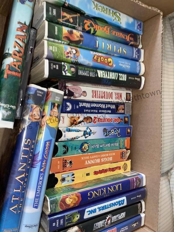 Box of VHS children's movies