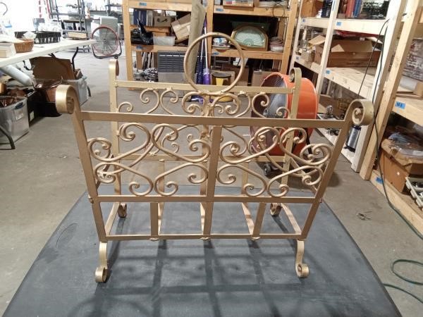 Gold colored magazine rack