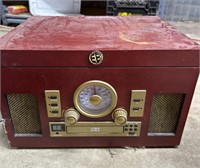 3 drones and an antique radio and record player