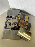 Beatles cd set, KC sunshine band tape, bill cosby