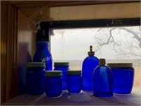 Assorted cobalt medicine bottles