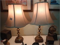Pair of brass candlestick lamps. Both work but