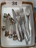 6 TWA metal utensils, 4 bottle openers