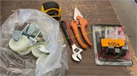 Tape Measure, Casters, Wrench, Pruners