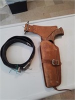Leather holster with wooden gun and leather belt