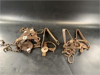 Lot including a steel animal trap, parts and piece