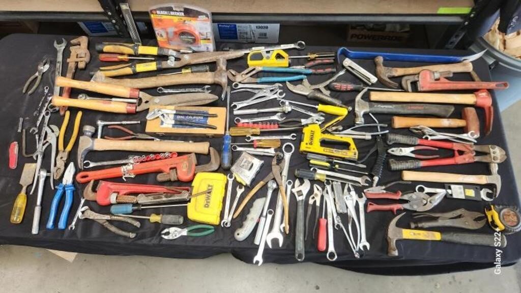 Large lot of tools  in a plastic bin