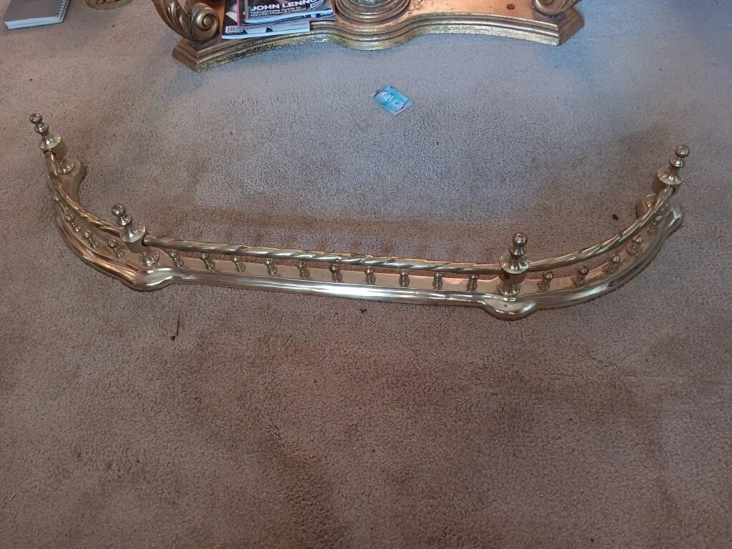 Solid brass fireplace finder guard.