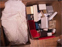 Two boxes including empty jewelry boxes, some