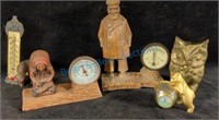 Brass owl and thermometers and barometers