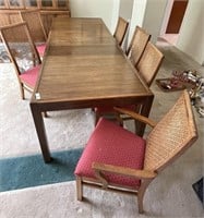 Dining room table and 6 cane back chairs