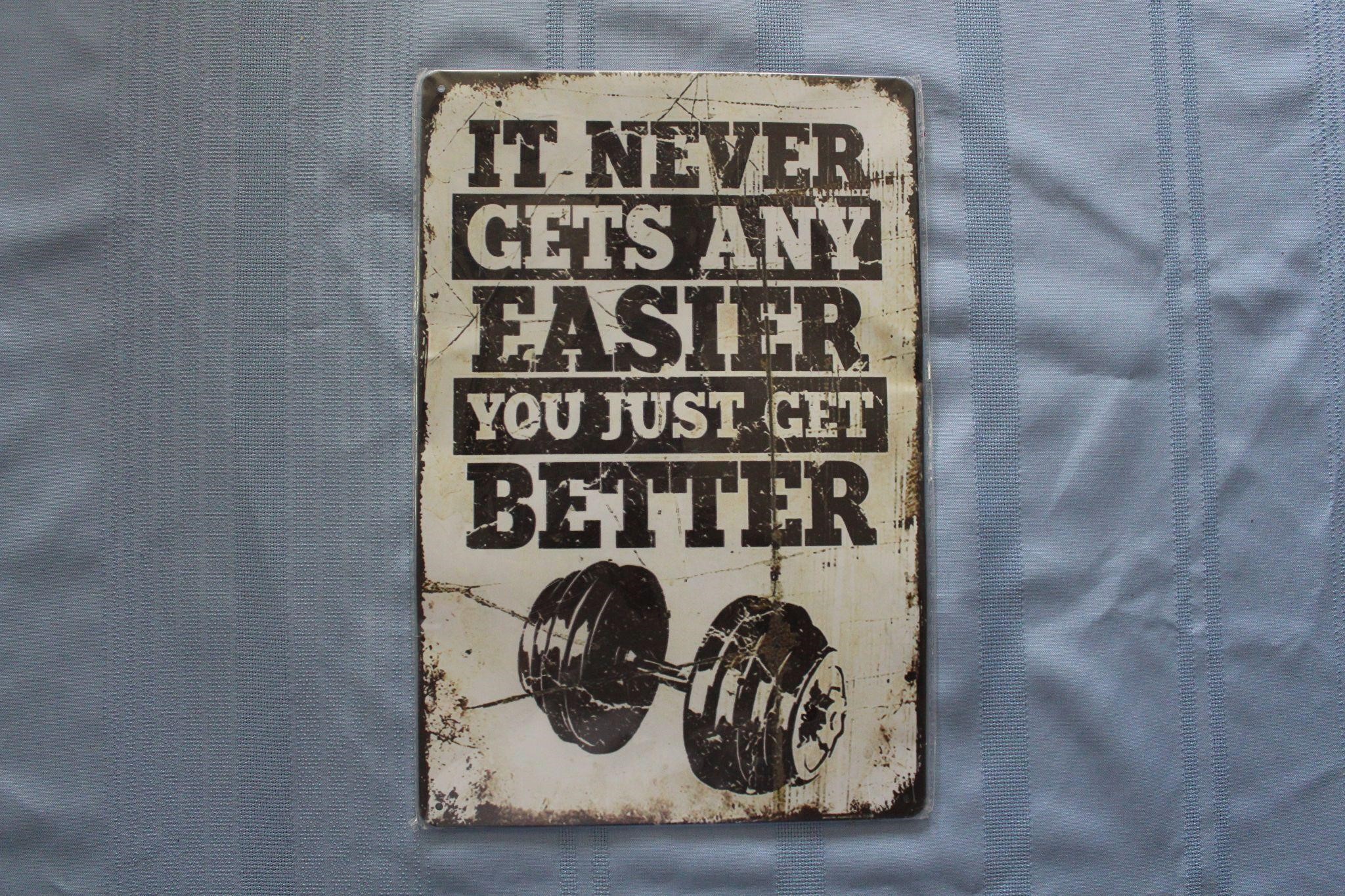 Retro Tin Sign: It Never Gets Any Easier