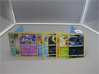 25 Unsorted Pokemon Cards