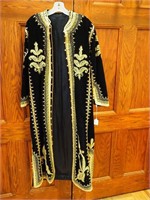 Full-length velvet coat with gold rope