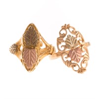 A Pair of Lady's Rings in Tri Color Gold