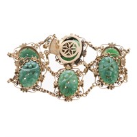 A Lady's 14K Carved Jade Link Bracelet