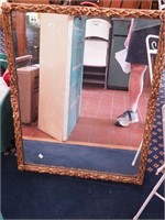 Decorative wall mirror with gesso