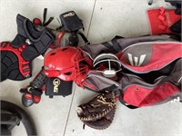 Bat bag with catchers gear, mizuno glove