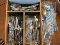 Stainless silverware, many sets