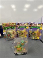 Lot of 4 TMNT Action Figures