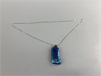 Art glass pendant with sterling silver bale on a s