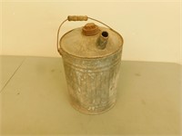Small metal oil can 14 in tall