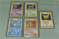 5 Pokémon Fossil holographic cards in sleeves: Gen