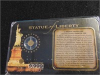 Statue of Liberty Coin in display
