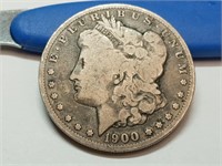 OF)  1900 silver Morgan dollar