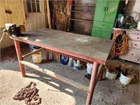 Metal table with Columbian vise