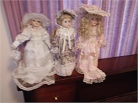3 porcelain dolls 16 inches tall